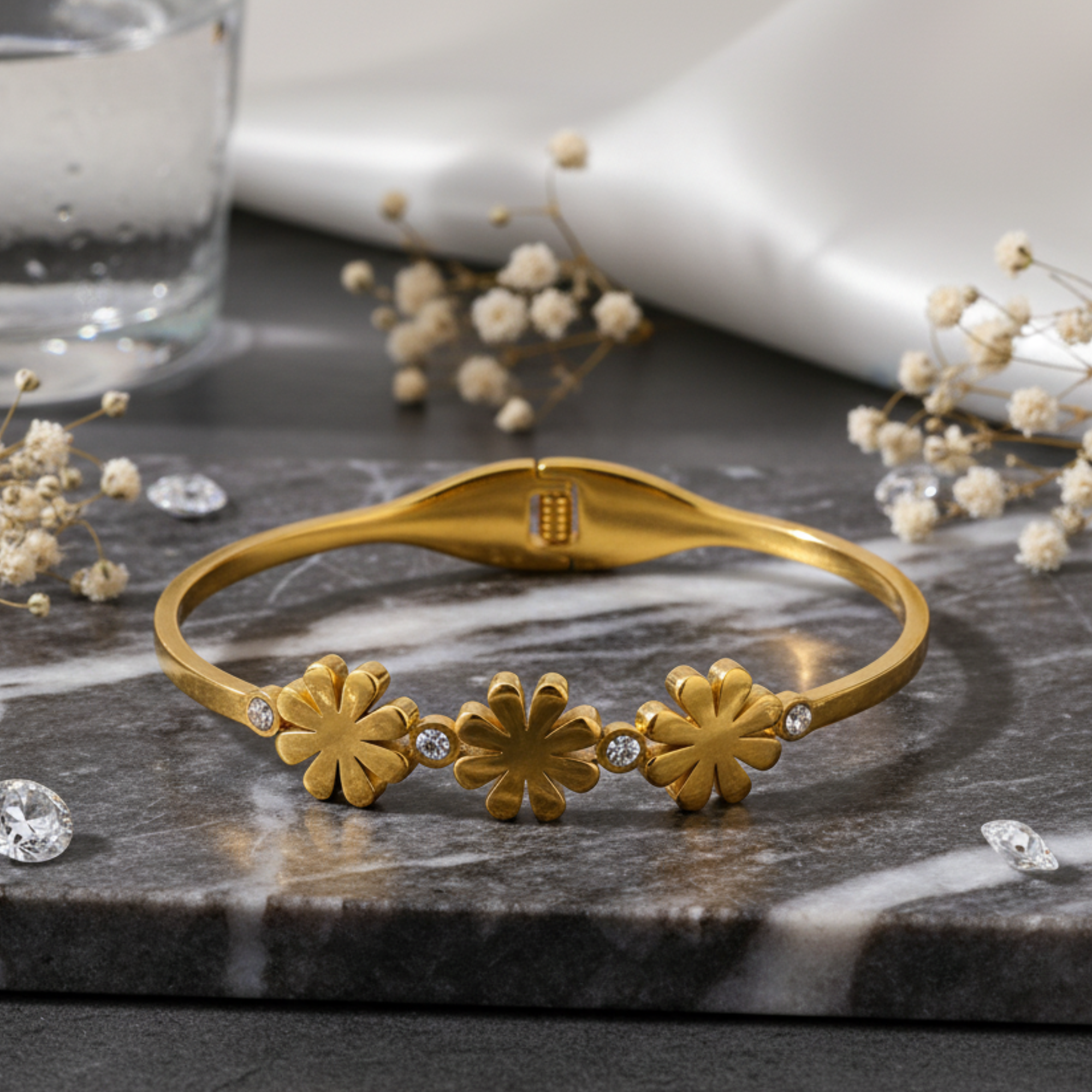 Gold Bangle with Dazzling Flower Accents